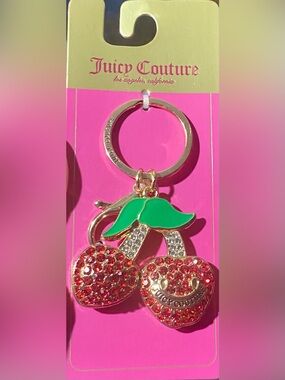 Juicy Couture cherry keychain features red crystal rhinestones and green enamel